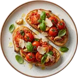 Bruschetta AXXES van boven: focaccia met tomatentapenade, trostomaten, basilicum en parmezaanschilfers op een wit bord
